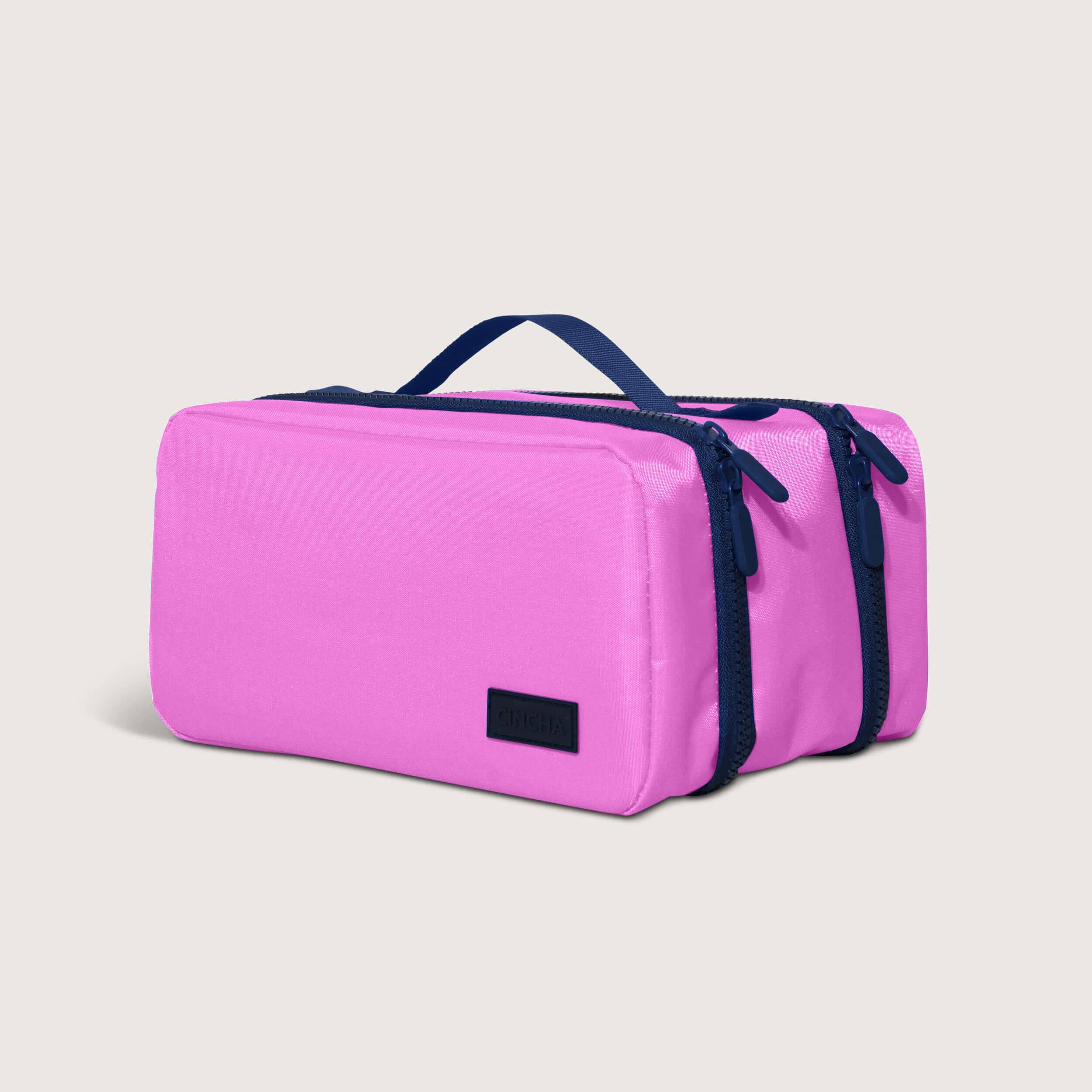 The Toiletry Bag By Cincha In Bonbon