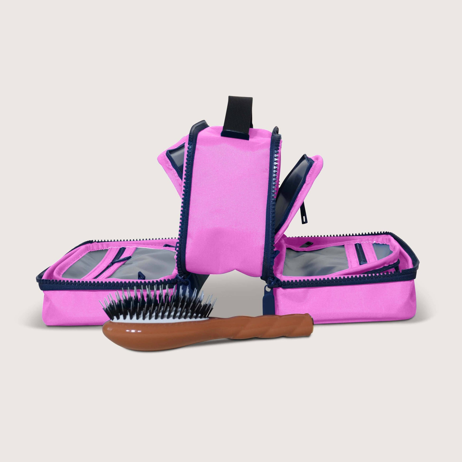 The Toiletry Bag By Cincha In Bonbon