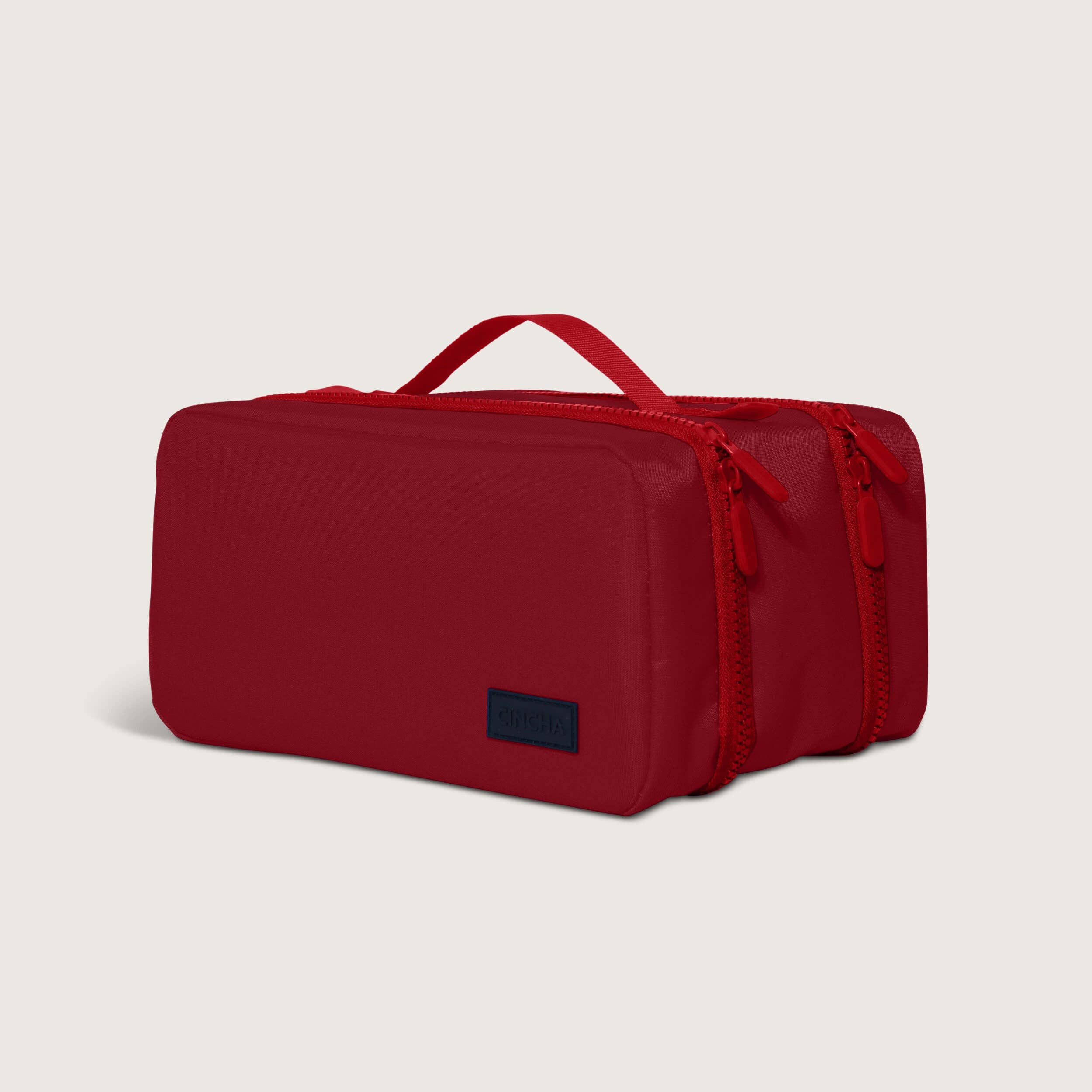 The Toiletry Bag By Cincha In Cherry