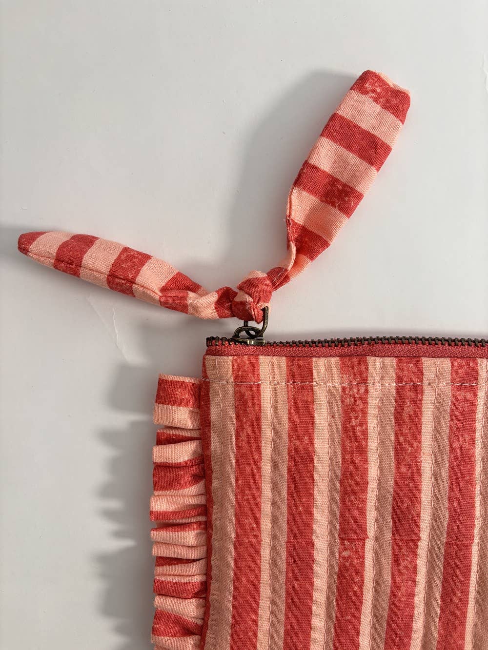 Handmade Pink And Red Striped Quilted Ruffle Pouch