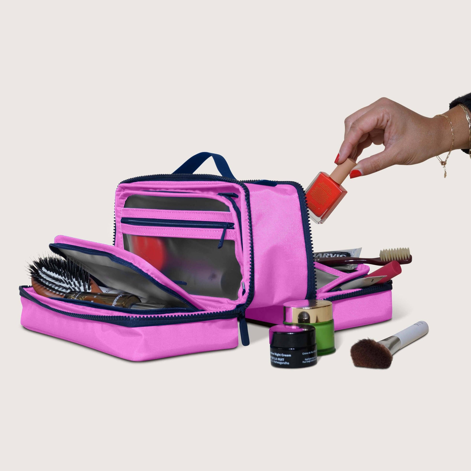 The Toiletry Bag By Cincha In Bonbon