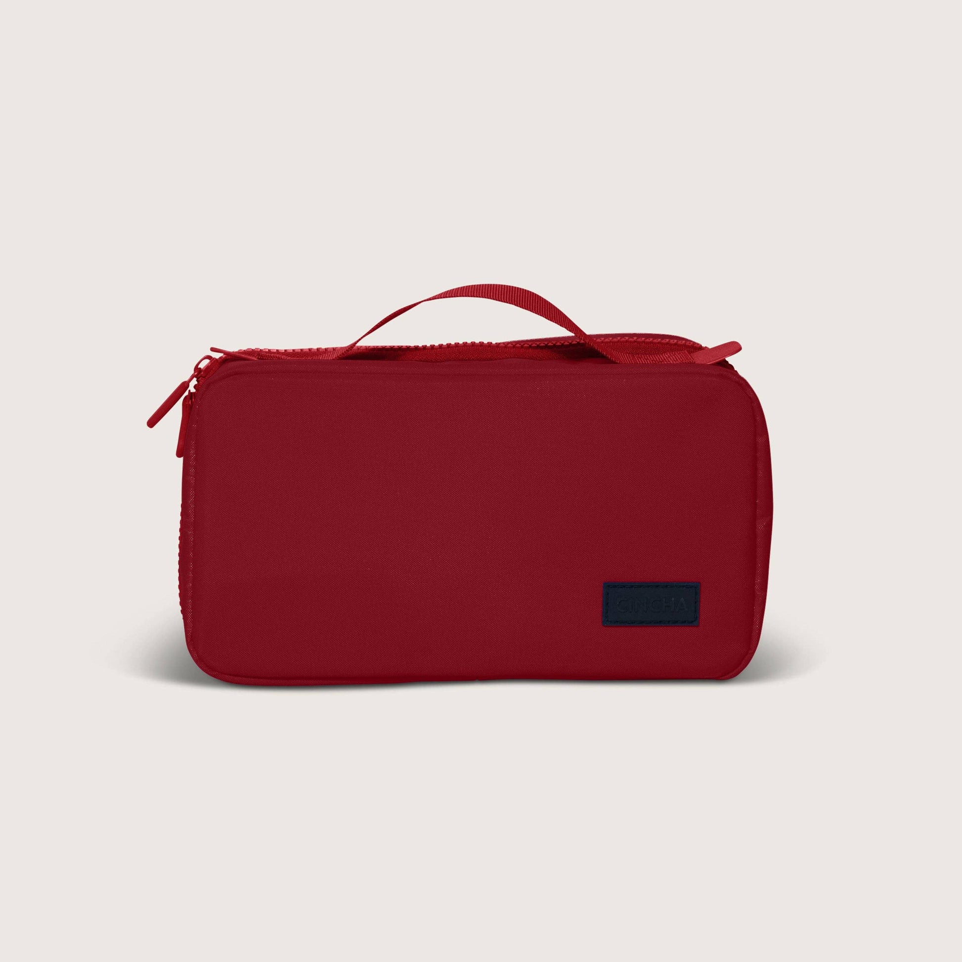 The Toiletry Bag By Cincha In Cherry